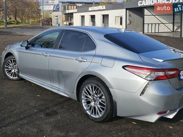 Сірий Тойота Камрі, об'ємом двигуна 2.49 л та пробігом 49 тис. км за 26100 $, фото 4 на Automoto.ua