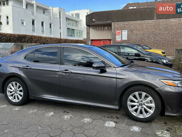 Сірий Тойота Камрі, об'ємом двигуна 2.49 л та пробігом 100 тис. км за 19700 $, фото 1 на Automoto.ua