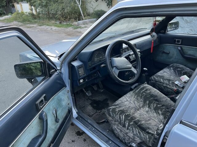 Синій Тойота Камрі, об'ємом двигуна 1.8 л та пробігом 750 тис. км за 761 $, фото 7 на Automoto.ua