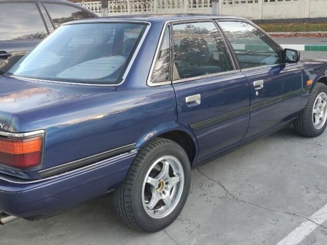 Синий Тойота Камри, объемом двигателя 2 л и пробегом 360 тыс. км за 1850 $, фото 11 на Automoto.ua