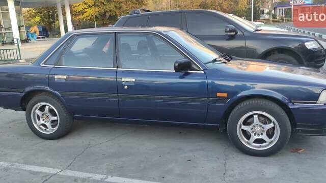 Синий Тойота Камри, объемом двигателя 2 л и пробегом 380 тыс. км за 1800 $, фото 9 на Automoto.ua