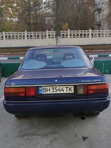 Синий Тойота Камри, объемом двигателя 2 л и пробегом 380 тыс. км за 1800 $, фото 11 на Automoto.ua