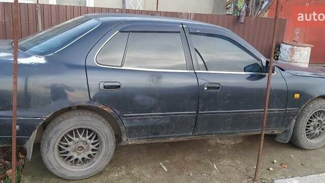 Синий Тойота Камри, объемом двигателя 2.2 л и пробегом 646 тыс. км за 1500 $, фото 4 на Automoto.ua