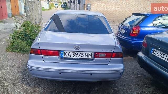 Синий Тойота Камри, объемом двигателя 3 л и пробегом 336 тыс. км за 3200 $, фото 13 на Automoto.ua