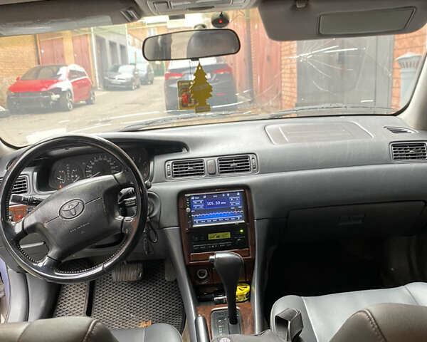 Синий Тойота Камри, объемом двигателя 3 л и пробегом 300 тыс. км за 3000 $, фото 3 на Automoto.ua