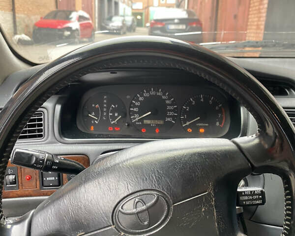 Синий Тойота Камри, объемом двигателя 3 л и пробегом 300 тыс. км за 3000 $, фото 2 на Automoto.ua