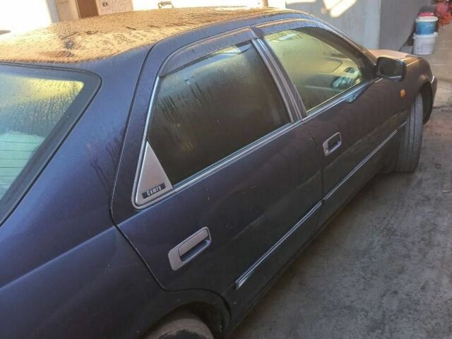 Синій Тойота Камрі, об'ємом двигуна 3 л та пробігом 390 тис. км за 2550 $, фото 3 на Automoto.ua