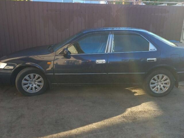 Синій Тойота Камрі, об'ємом двигуна 3 л та пробігом 390 тис. км за 2550 $, фото 4 на Automoto.ua