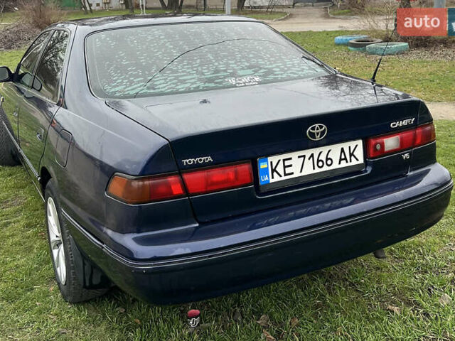 Синий Тойота Камри, объемом двигателя 3 л и пробегом 555 тыс. км за 3300 $, фото 8 на Automoto.ua