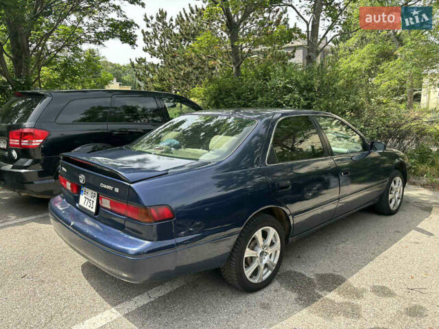 Синий Тойота Камри, объемом двигателя 2.16 л и пробегом 250 тыс. км за 2999 $, фото 3 на Automoto.ua