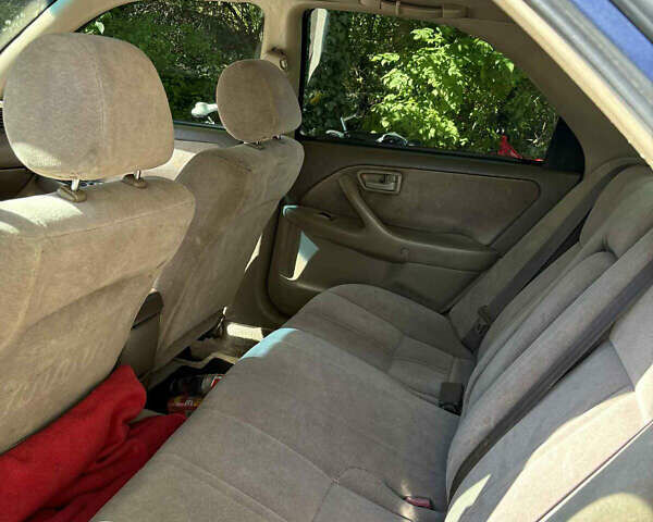 Синий Тойота Камри, объемом двигателя 2.16 л и пробегом 250 тыс. км за 2999 $, фото 6 на Automoto.ua