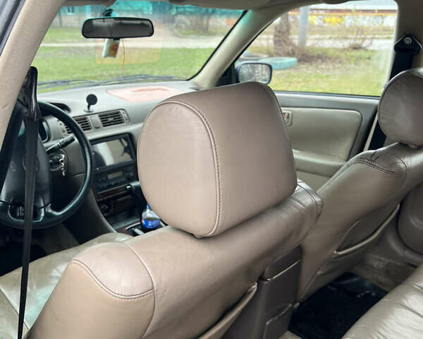 Синий Тойота Камри, объемом двигателя 3 л и пробегом 555 тыс. км за 3300 $, фото 11 на Automoto.ua