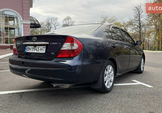 Синій Тойота Камрі, об'ємом двигуна 3 л та пробігом 415 тис. км за 5900 $, фото 3 на Automoto.ua
