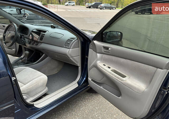 Синій Тойота Камрі, об'ємом двигуна 3 л та пробігом 415 тис. км за 5900 $, фото 7 на Automoto.ua