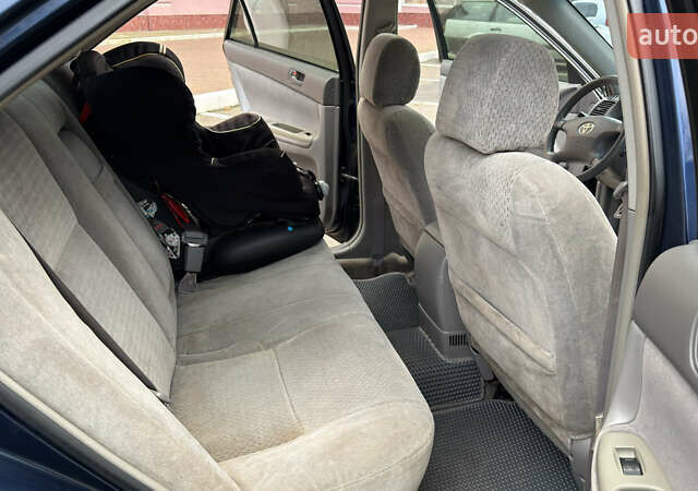 Синій Тойота Камрі, об'ємом двигуна 3 л та пробігом 415 тис. км за 5900 $, фото 6 на Automoto.ua
