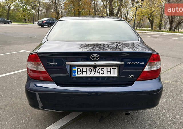 Синій Тойота Камрі, об'ємом двигуна 3 л та пробігом 415 тис. км за 5900 $, фото 16 на Automoto.ua