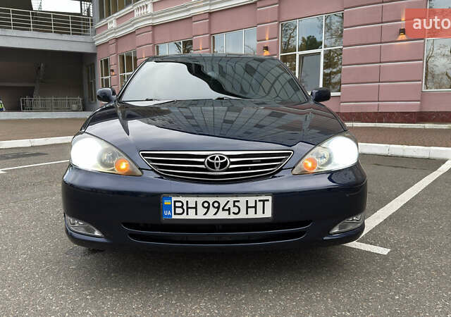 Синій Тойота Камрі, об'ємом двигуна 3 л та пробігом 415 тис. км за 5900 $, фото 17 на Automoto.ua