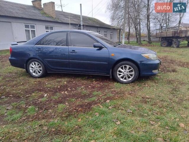 Синий Тойота Камри, объемом двигателя 2.36 л и пробегом 228 тыс. км за 4650 $, фото 9 на Automoto.ua