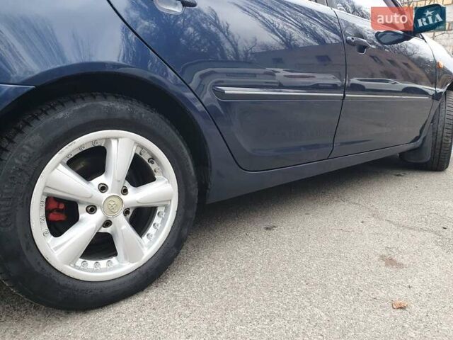 Синий Тойота Камри, объемом двигателя 2.4 л и пробегом 300 тыс. км за 4900 $, фото 12 на Automoto.ua