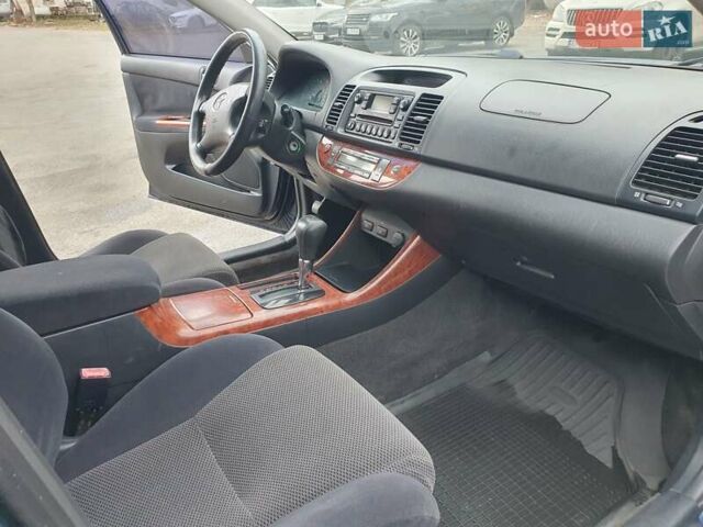 Синій Тойота Камрі, об'ємом двигуна 2.36 л та пробігом 300 тис. км за 5300 $, фото 24 на Automoto.ua