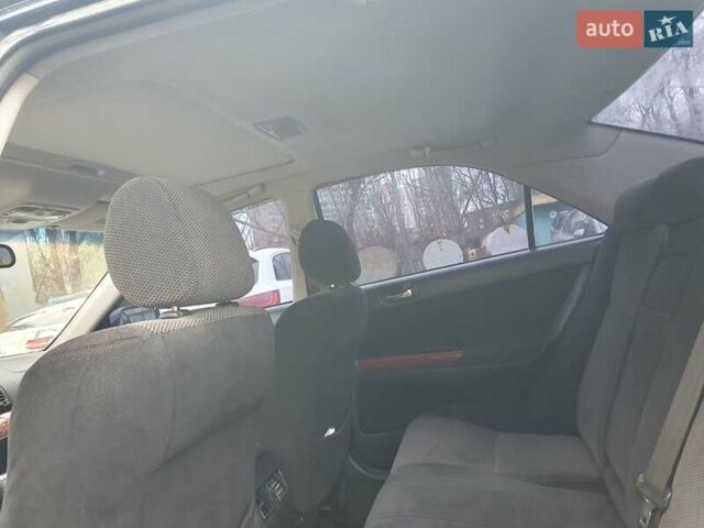 Синій Тойота Камрі, об'ємом двигуна 2.36 л та пробігом 300 тис. км за 5300 $, фото 31 на Automoto.ua