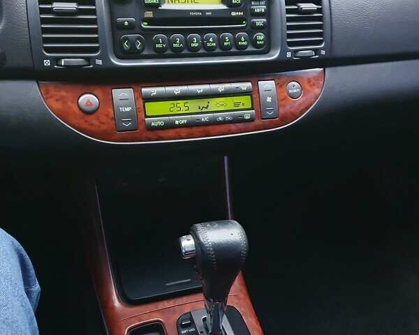 Синій Тойота Камрі, об'ємом двигуна 2.36 л та пробігом 300 тис. км за 5300 $, фото 25 на Automoto.ua