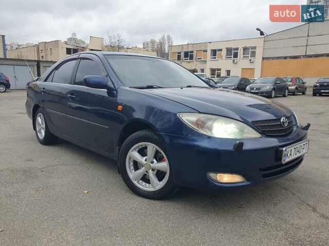 Синий Тойота Камри, объемом двигателя 2.36 л и пробегом 300 тыс. км за 4500 $, фото 1 на Automoto.ua