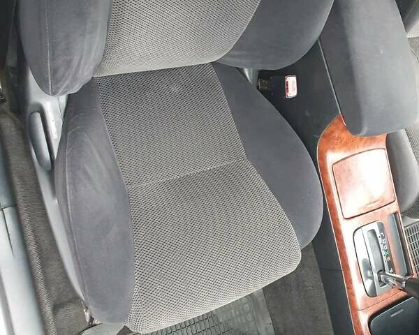 Синий Тойота Камри, объемом двигателя 2.4 л и пробегом 300 тыс. км за 4900 $, фото 39 на Automoto.ua