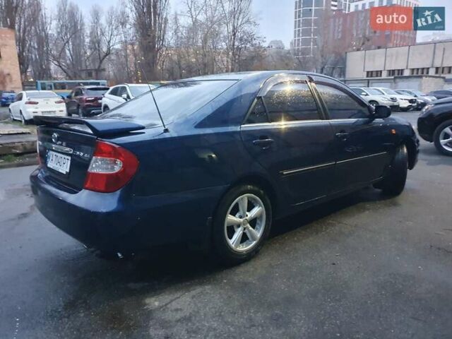 Синий Тойота Камри, объемом двигателя 2.4 л и пробегом 300 тыс. км за 4900 $, фото 40 на Automoto.ua