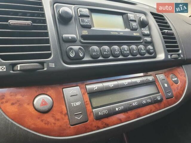 Синий Тойота Камри, объемом двигателя 2.36 л и пробегом 300 тыс. км за 4500 $, фото 31 на Automoto.ua