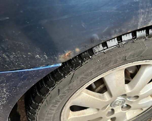 Синий Тойота Камри, объемом двигателя 2.4 л и пробегом 233 тыс. км за 5200 $, фото 9 на Automoto.ua