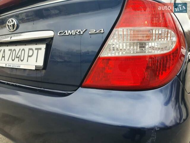 Синий Тойота Камри, объемом двигателя 2.4 л и пробегом 300 тыс. км за 4900 $, фото 32 на Automoto.ua