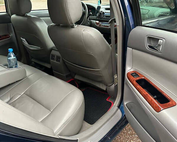 Синий Тойота Камри, объемом двигателя 2.4 л и пробегом 233 тыс. км за 5200 $, фото 7 на Automoto.ua