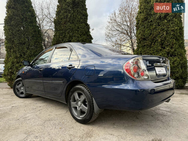 Синий Тойота Камри, объемом двигателя 3 л и пробегом 138 тыс. км за 6900 $, фото 21 на Automoto.ua