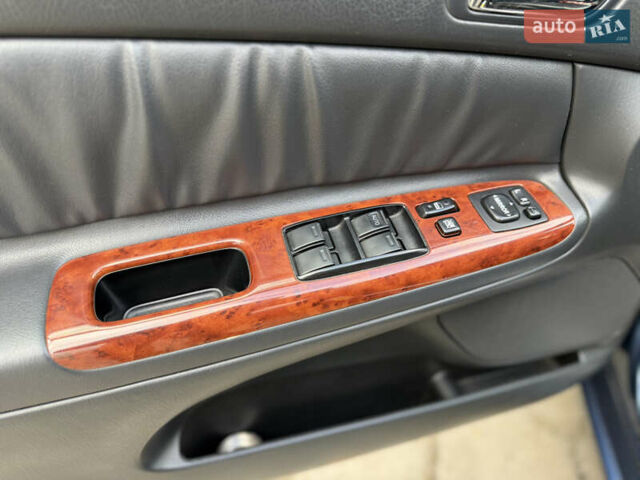 Синий Тойота Камри, объемом двигателя 3 л и пробегом 138 тыс. км за 6900 $, фото 33 на Automoto.ua