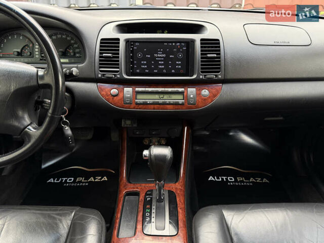 Синий Тойота Камри, объемом двигателя 3 л и пробегом 138 тыс. км за 6900 $, фото 53 на Automoto.ua