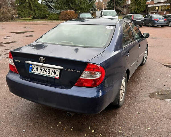 Синий Тойота Камри, объемом двигателя 2.4 л и пробегом 233 тыс. км за 5200 $, фото 2 на Automoto.ua