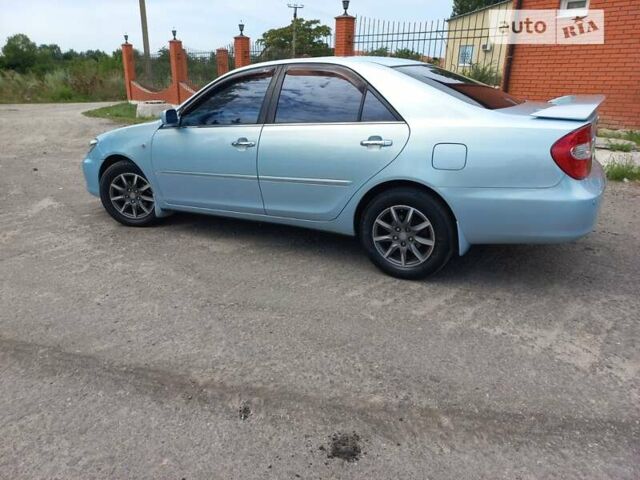 Синій Тойота Камрі, об'ємом двигуна 3 л та пробігом 332 тис. км за 7000 $, фото 4 на Automoto.ua