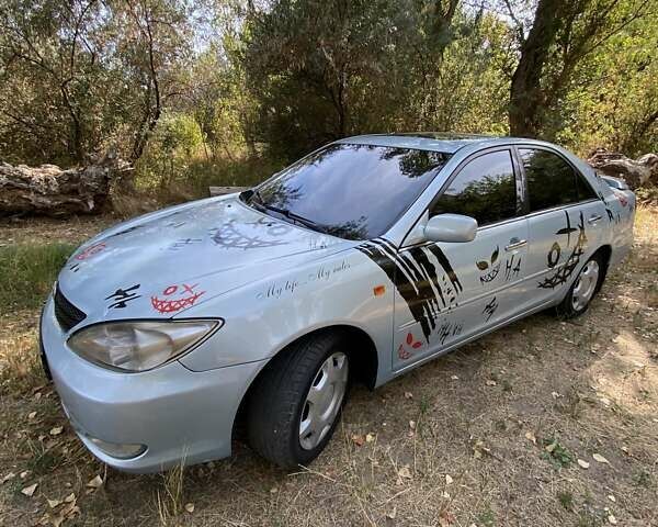 Синий Тойота Камри, объемом двигателя 3 л и пробегом 225 тыс. км за 5000 $, фото 8 на Automoto.ua