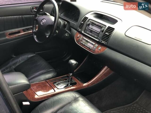 Синій Тойота Камрі, об'ємом двигуна 3 л та пробігом 265 тис. км за 7200 $, фото 47 на Automoto.ua