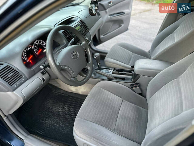 Синий Тойота Камри, объемом двигателя 2.4 л и пробегом 270 тыс. км за 4800 $, фото 8 на Automoto.ua