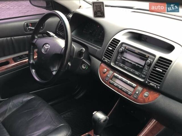 Синій Тойота Камрі, об'ємом двигуна 3 л та пробігом 265 тис. км за 7200 $, фото 44 на Automoto.ua