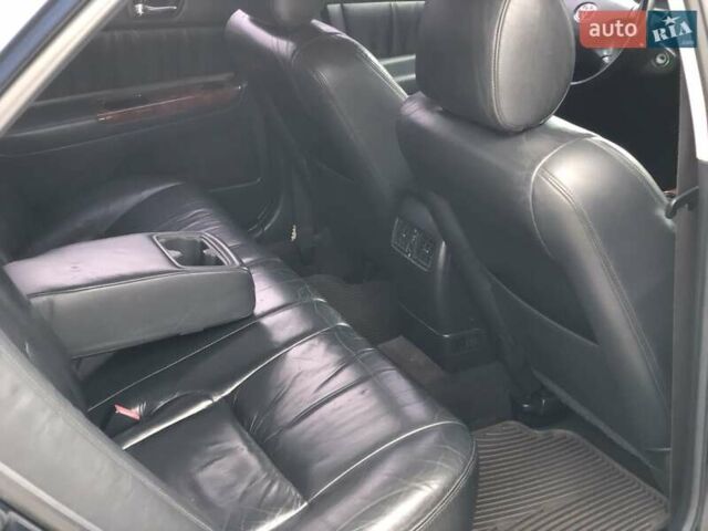 Синій Тойота Камрі, об'ємом двигуна 3 л та пробігом 265 тис. км за 7200 $, фото 73 на Automoto.ua