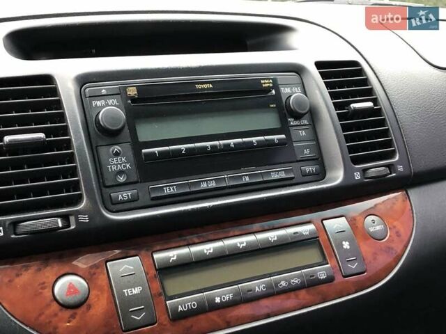 Синій Тойота Камрі, об'ємом двигуна 3 л та пробігом 265 тис. км за 7200 $, фото 82 на Automoto.ua