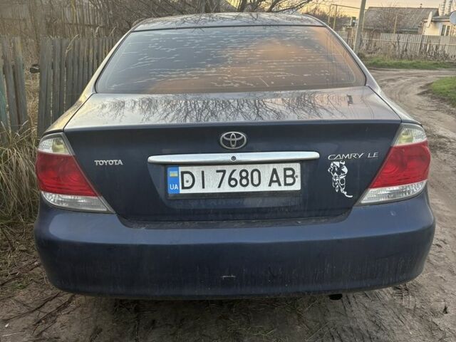 Синий Тойота Камри, объемом двигателя 2.4 л и пробегом 500 тыс. км за 3500 $, фото 1 на Automoto.ua
