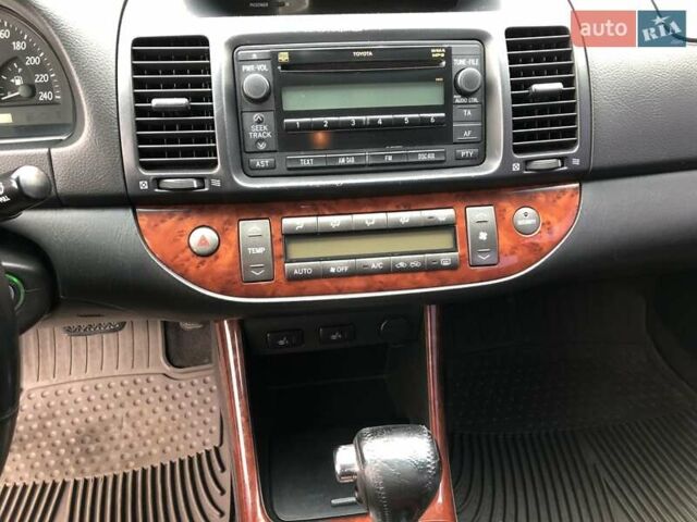 Синій Тойота Камрі, об'ємом двигуна 3 л та пробігом 265 тис. км за 7200 $, фото 69 на Automoto.ua