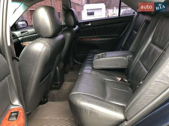 Синій Тойота Камрі, об'ємом двигуна 3 л та пробігом 265 тис. км за 7200 $, фото 58 на Automoto.ua