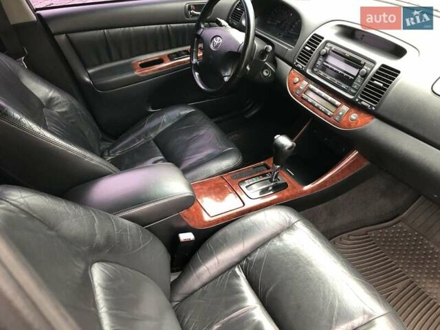 Синій Тойота Камрі, об'ємом двигуна 3 л та пробігом 265 тис. км за 7200 $, фото 45 на Automoto.ua