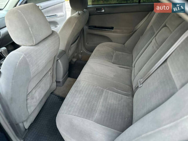 Синий Тойота Камри, объемом двигателя 2.4 л и пробегом 270 тыс. км за 4800 $, фото 6 на Automoto.ua