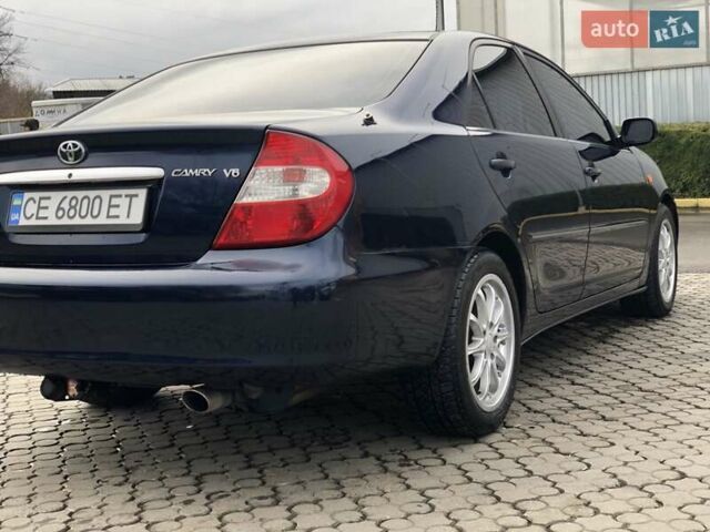 Синій Тойота Камрі, об'ємом двигуна 3 л та пробігом 265 тис. км за 7200 $, фото 9 на Automoto.ua